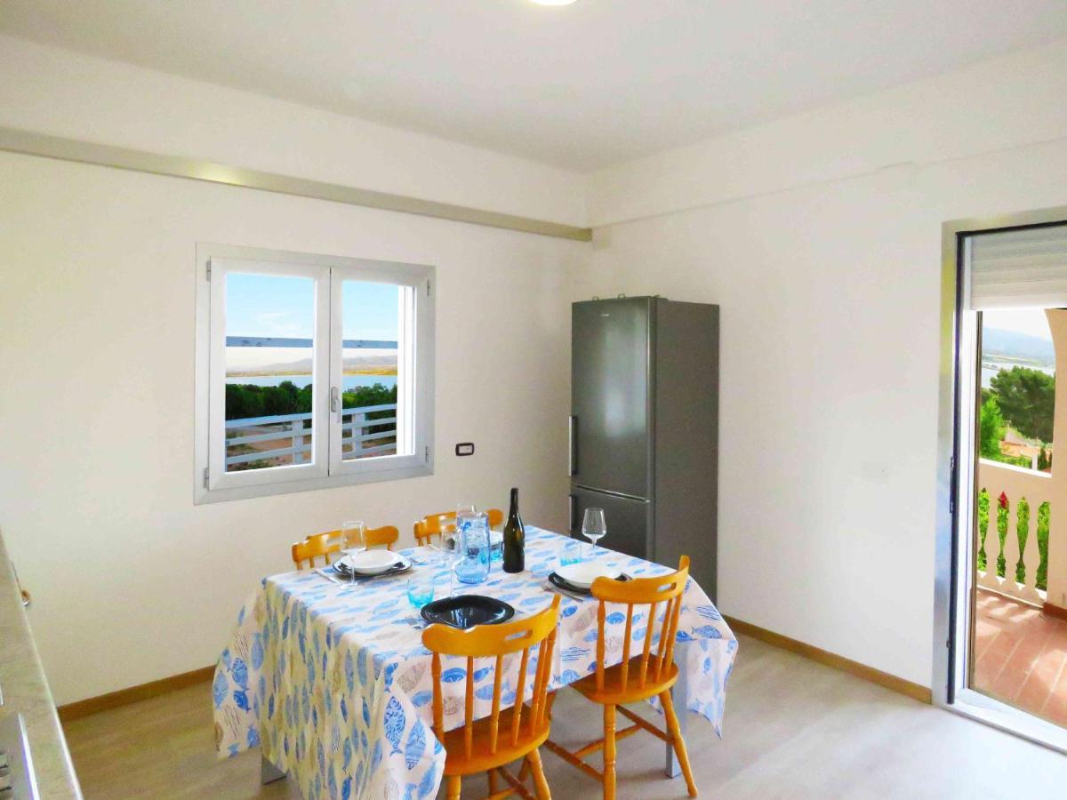 Panohome Porto Pino Exterior photo