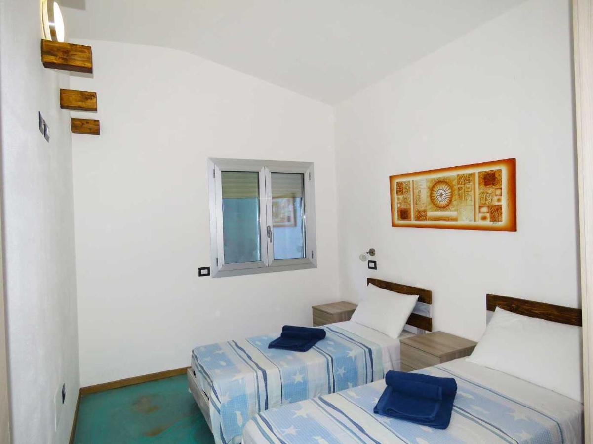 Panohome Porto Pino Exterior photo