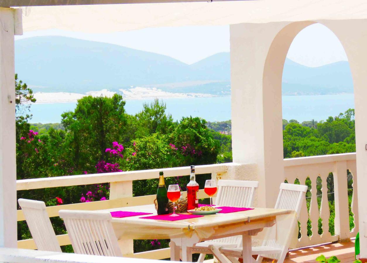 Panohome Porto Pino Exterior photo